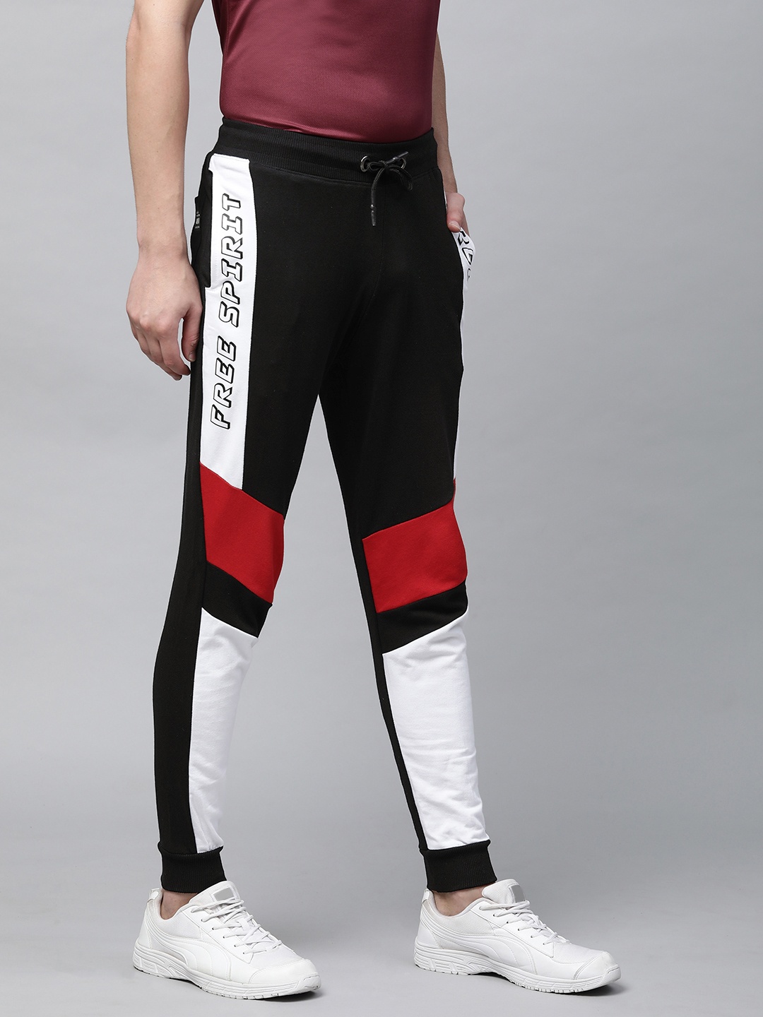 

abof Men Black & White Colourblocked Regular Fit Printed Joggers