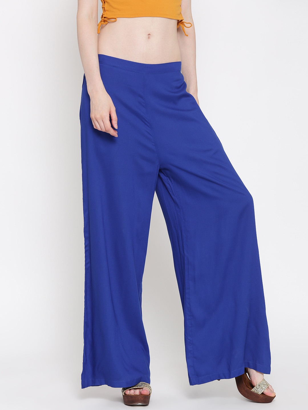 

Fusion Beats Women Blue Solid Liva Palazzos