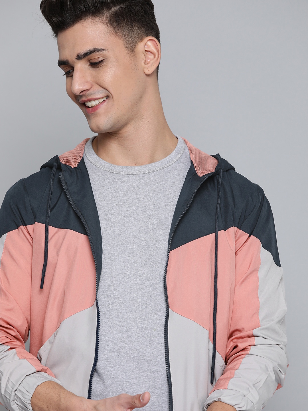 

Mast & Harbour Men Navy Blue & Peach-Coloured Colourblocked Hooded Bomber Jacket