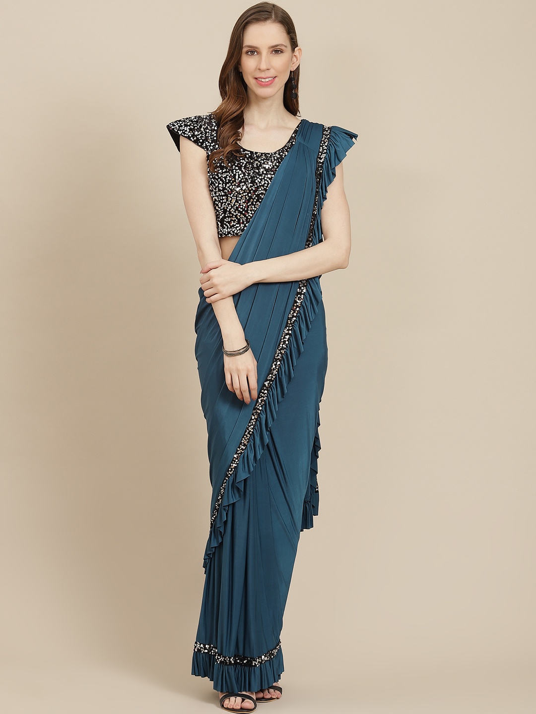 

Grancy Teal Blue Solid Ready to Wear Saree