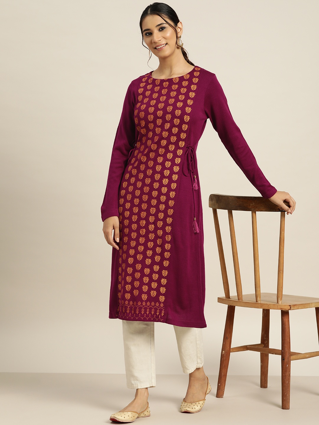 

Sangria Women Magenta & Golden Ethnic Motifs Printed Winter A-Line Kurta