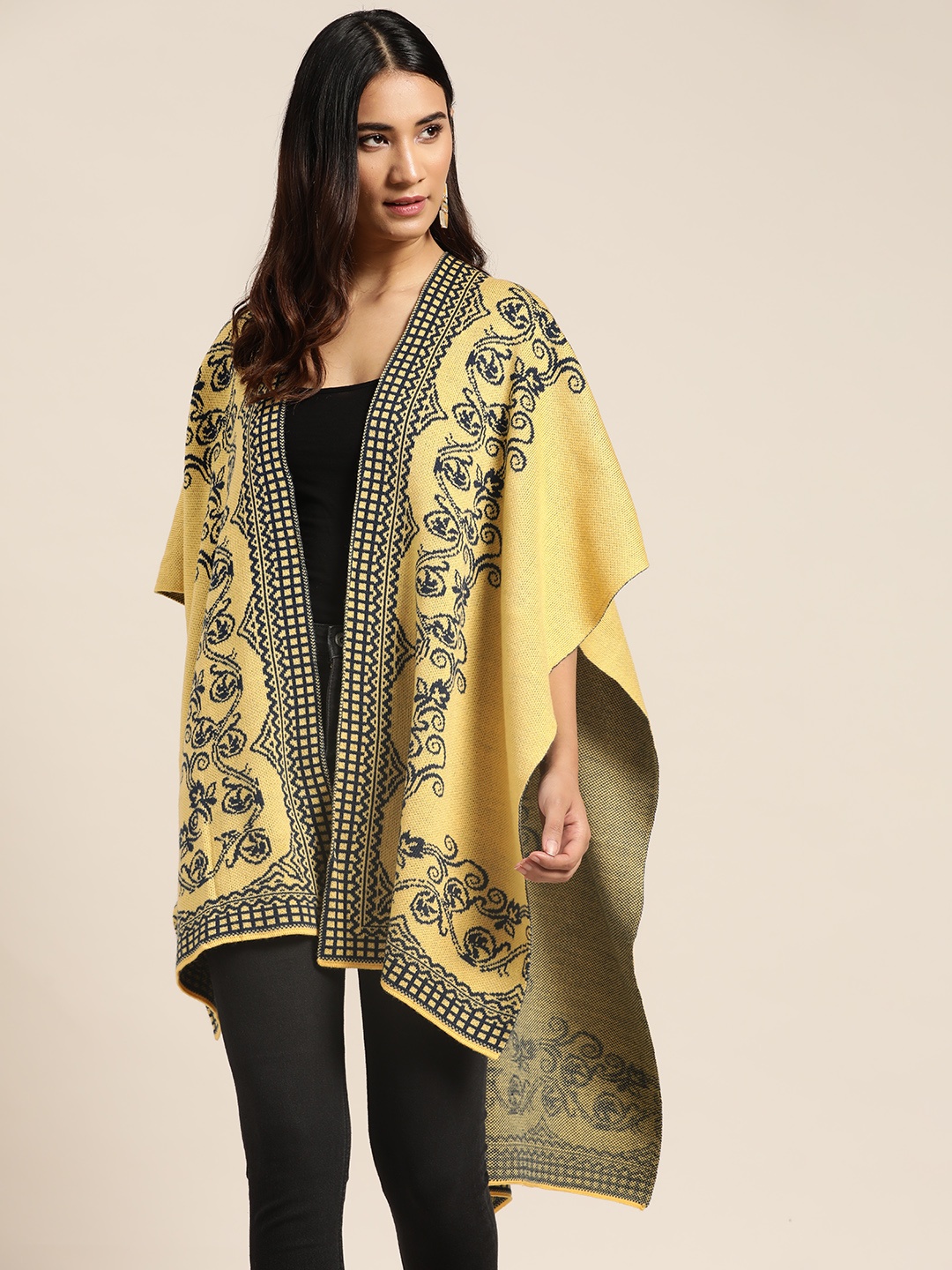 

Sangria Women Mustard Yellow & Black Printed Longline Winter Shrug