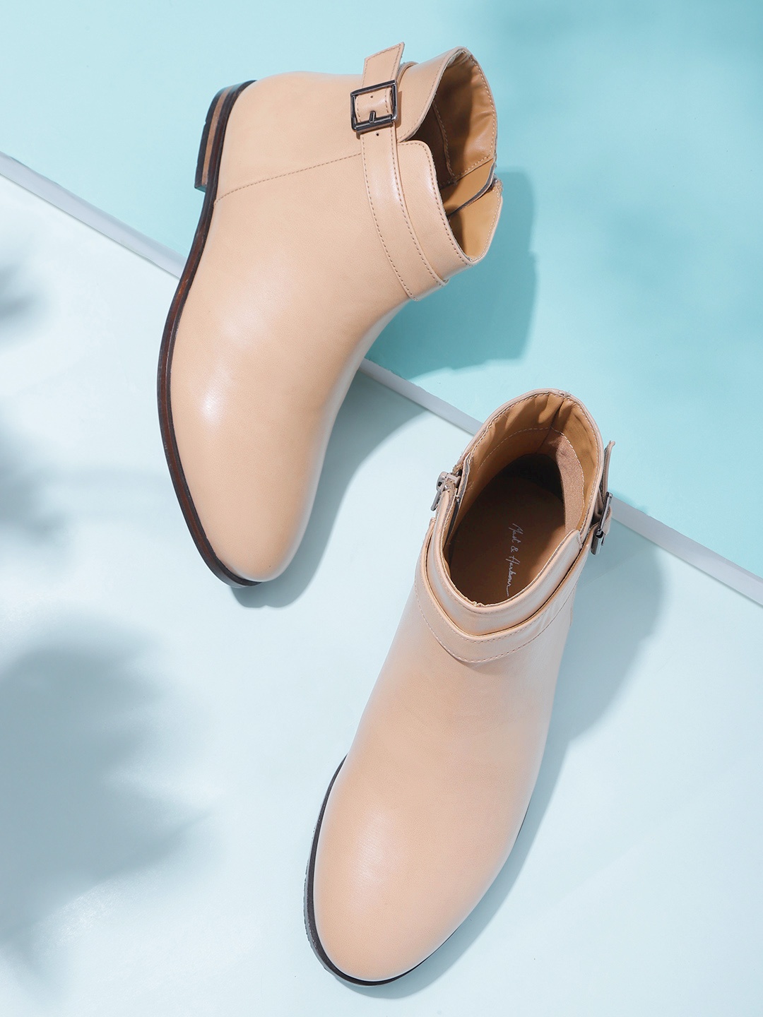 

Mast & Harbour Women Beige Glossy Finish Mid-Top Flat Boots with Buckle Detail