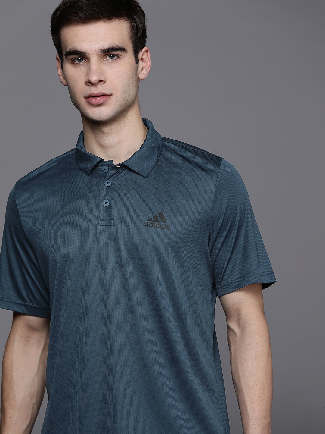 

ADIDAS Men Teal Green Solid Polo Collar Training Plain T-shirt