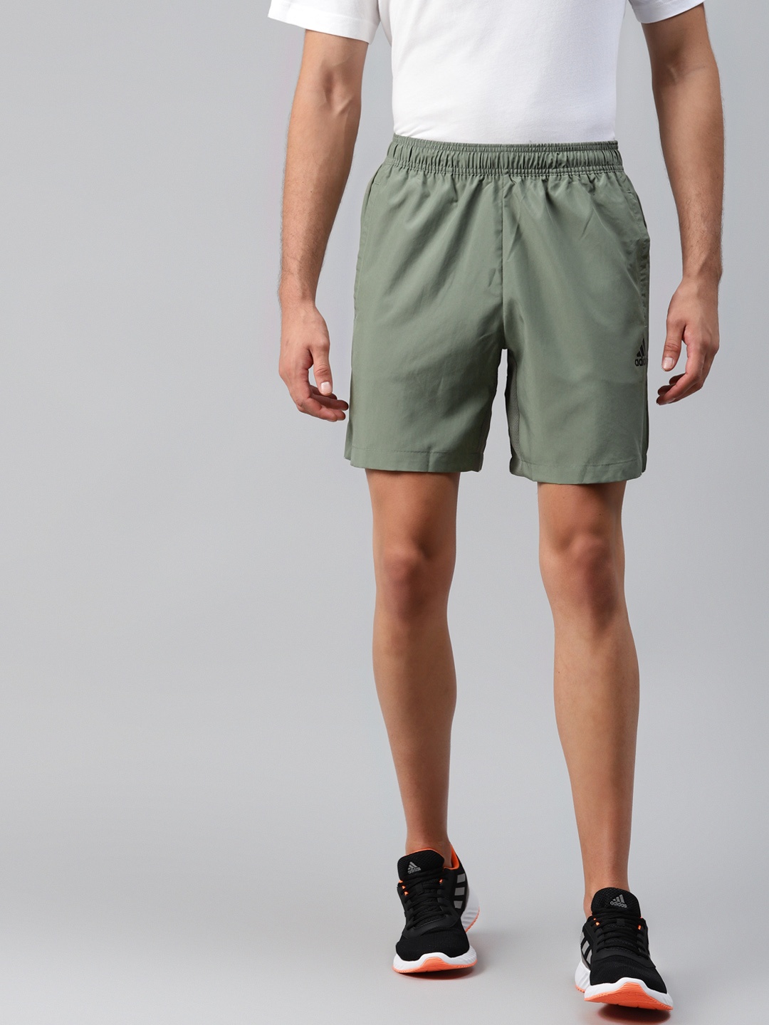 

ADIDAS Men Olive Green Woven Solid Mid-Rise Sports Shorts