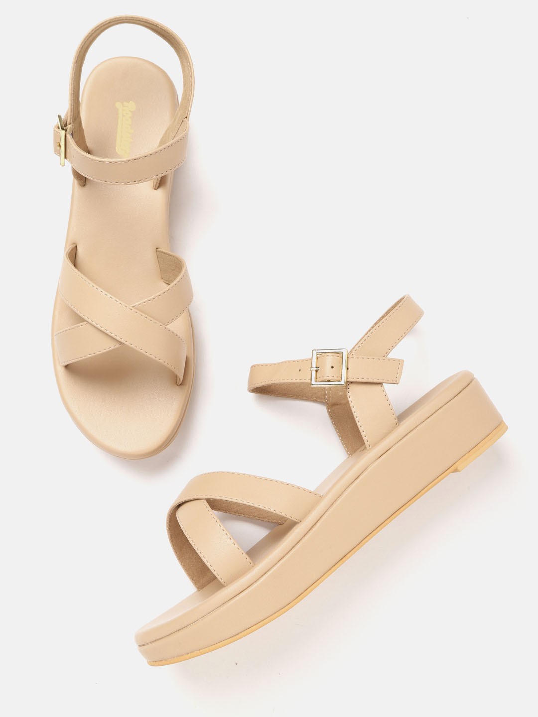 

Roadster Beige Solid Wedges