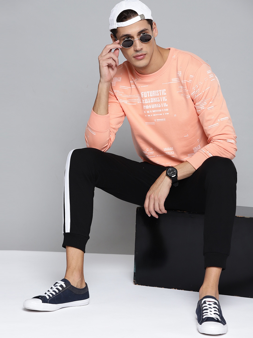 

Kook N Keech Men Peach-Coloured & White Printed Sweatshirt