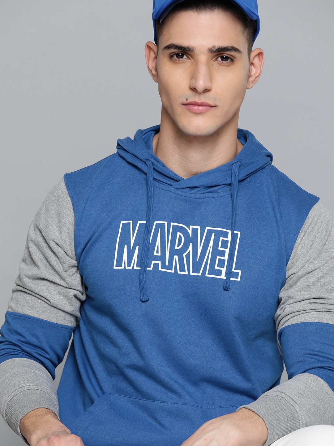 

Kook N Keech Marvel Men Blue & Grey Melange Printed Hooded Sweatshirt