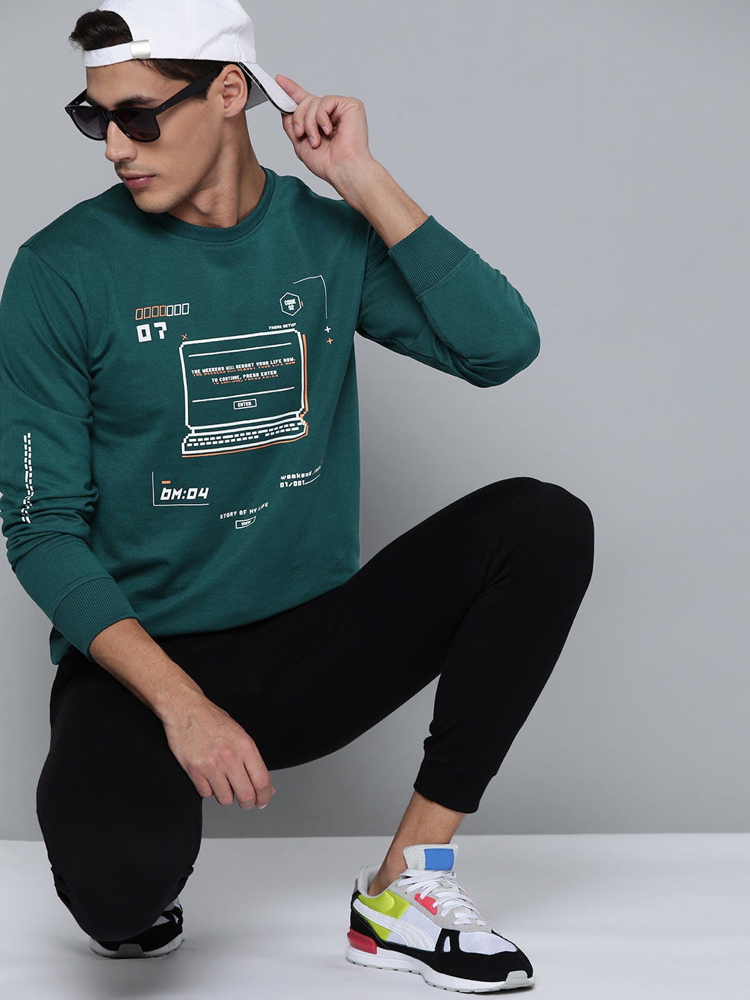 

Kook N Keech Men Teal Green Printed Sweatshirt