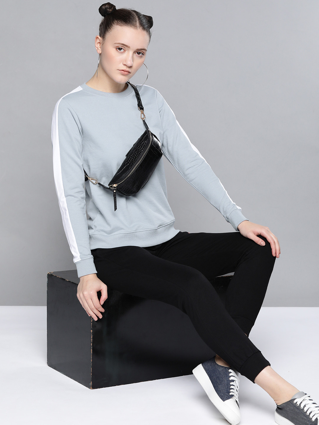 

Kook N Keech Women Blue & White Solid Sweatshirt