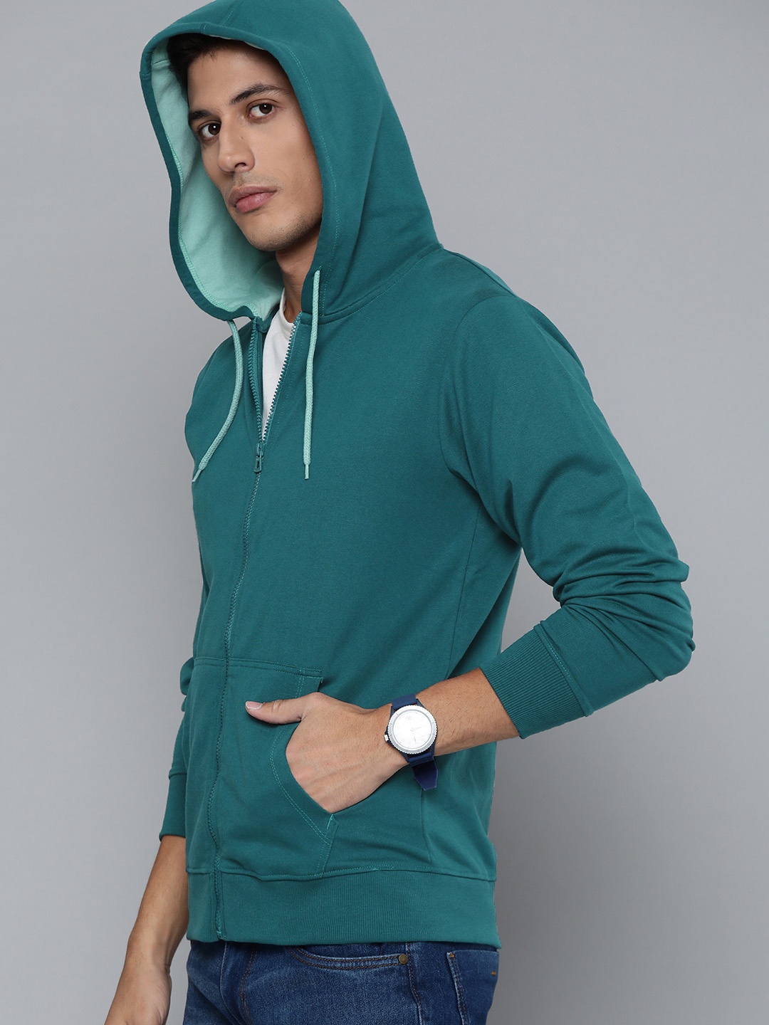 

Kook N Keech Men Teal Green Solid Hooded Sweatshirt