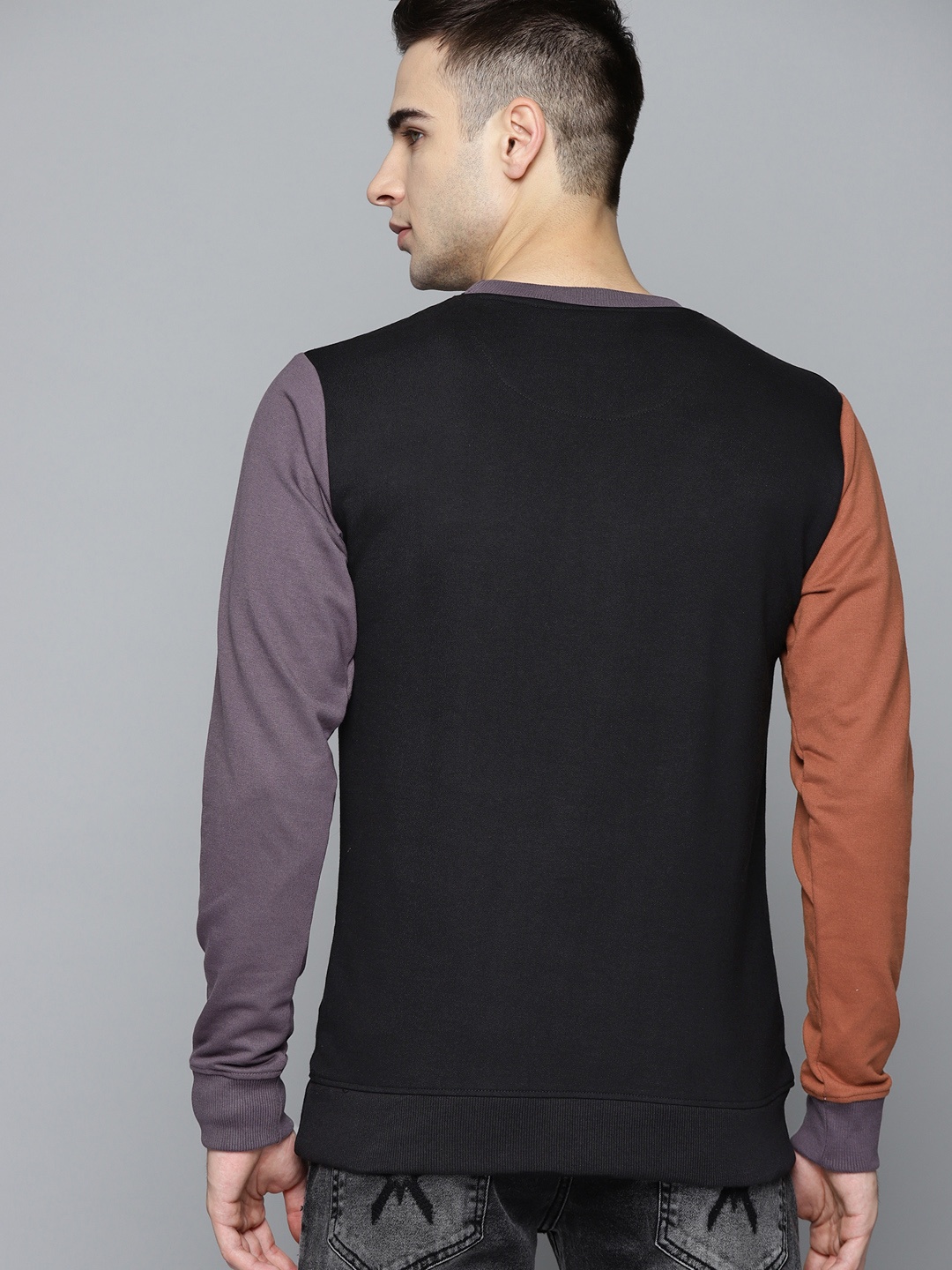 

Kook N Keech Men Black Solid Sweatshirt