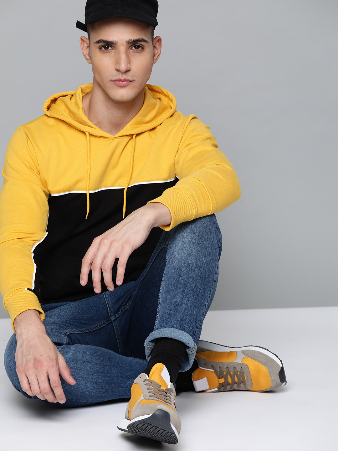 

Kook N Keech Men Black & Yellow Colourblocked Hooded Sweatshirt
