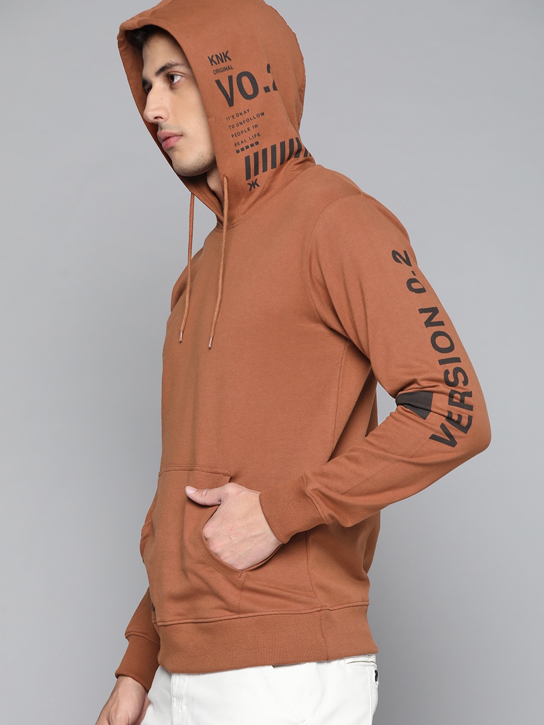 

Kook N Keech Men Brown Solid Hooded Sweatshirt