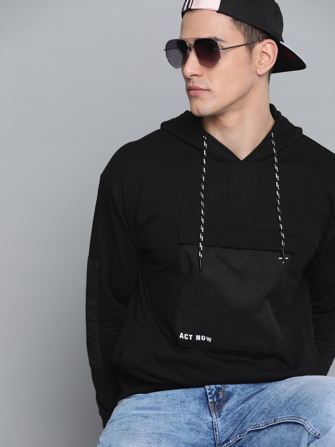 

Kook N Keech Men Black Solid Hooded Sweatshirt