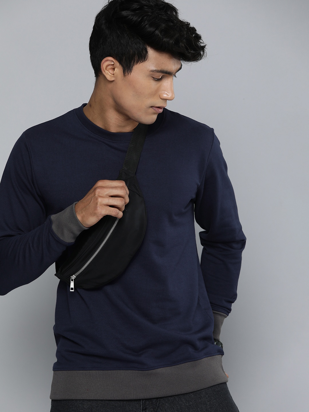 

Kook N Keech Men Navy Blue Solid Sweatshirt
