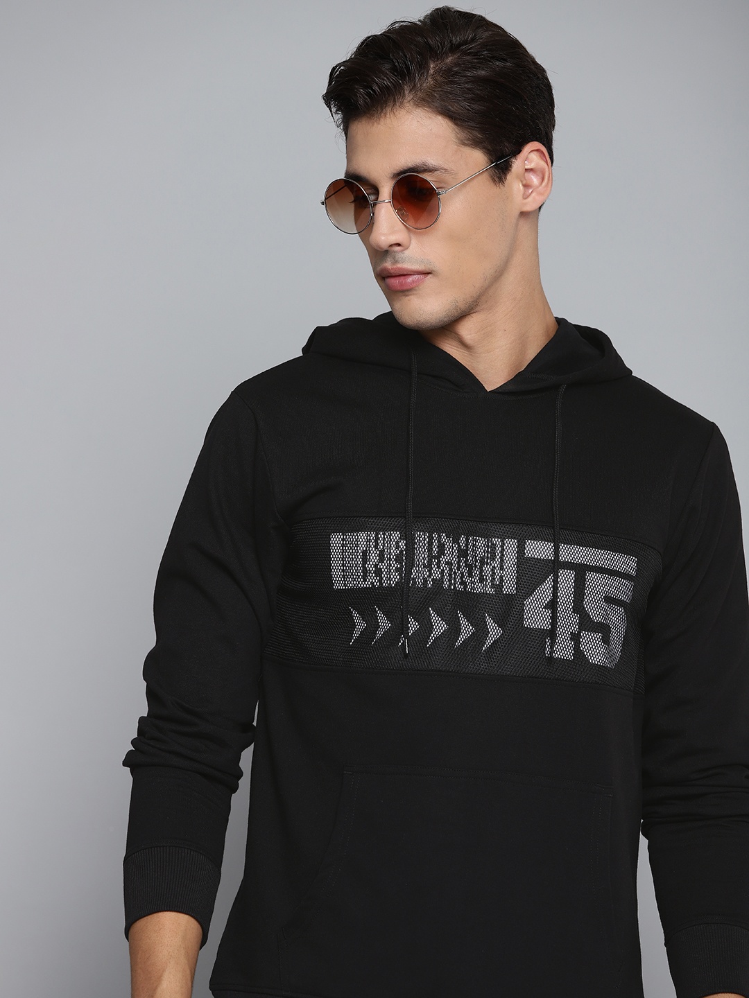 

Kook N Keech Men Black & White Printed Hooded Sweatshirt