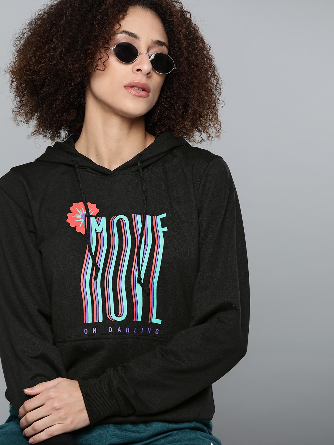 

Kook N Keech Women Black Printed Hooded Sweatshirt