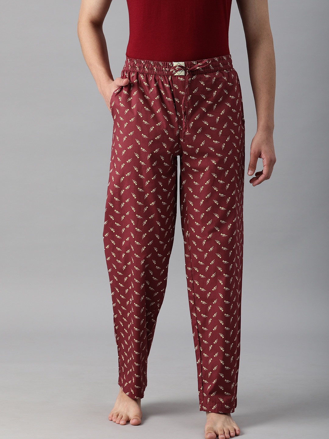 

abof Men Maroon & Yellow Conversational Print Pure Cotton Lounge Pants