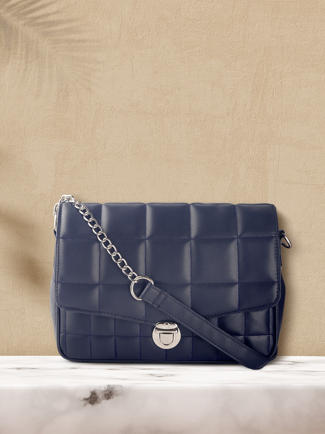 

Roadster Women Navy Blue Quilted Structured Sling Bag