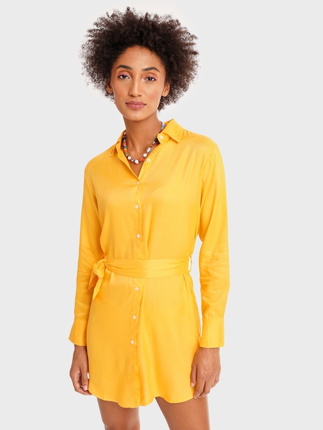 

Bewakoof Women Solid Yellow Tape Shirt Style Top