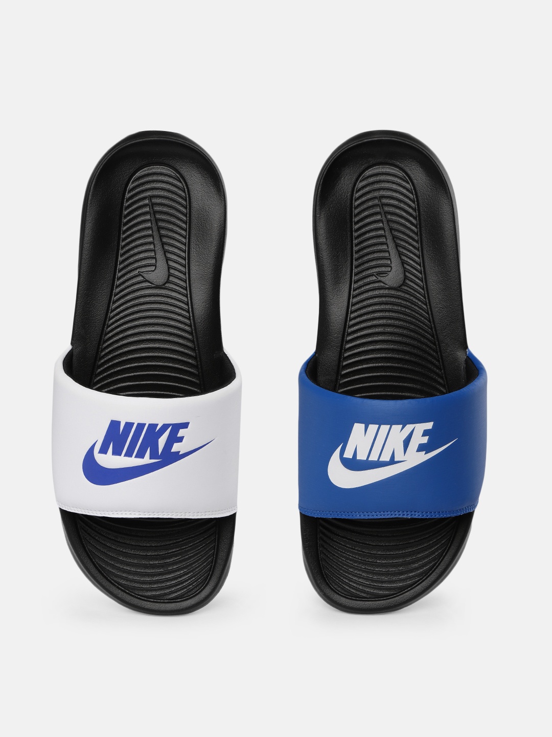 

Nike Men Blue & White VICTORI ONE SLIDE MIX Printed Sliders