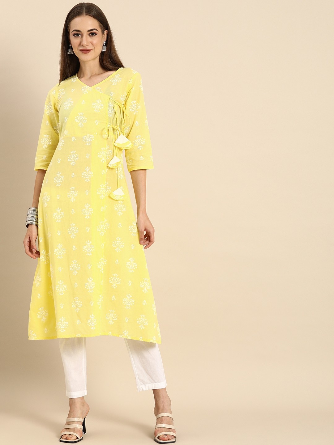 

Rajnandini Women Yellow Floral Printed Angrakha Pure Cotton Kurta with Trousers
