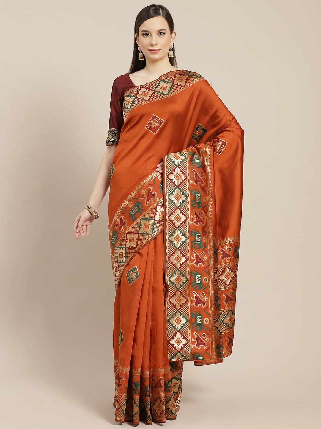 

SHUBHVASTRA Rust Orange & Green Ethnic Motifs Patola Saree
