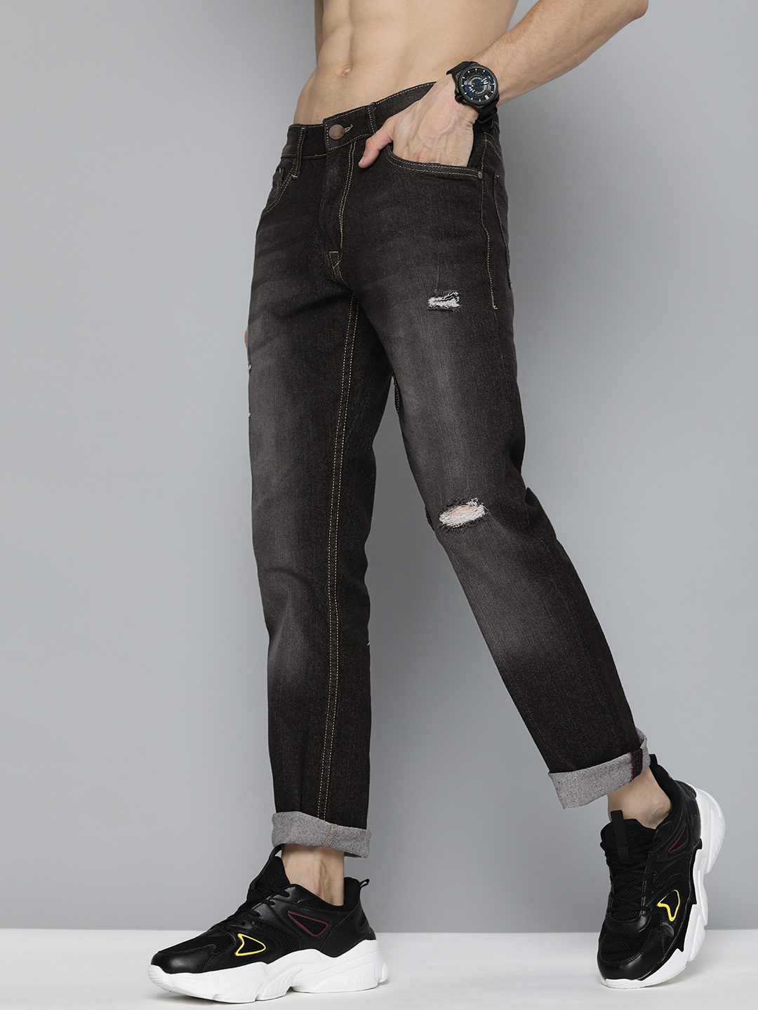 

HERE&NOW Men Black Slim Fit Mildly Distressed Light Fade Stretchable Jeans