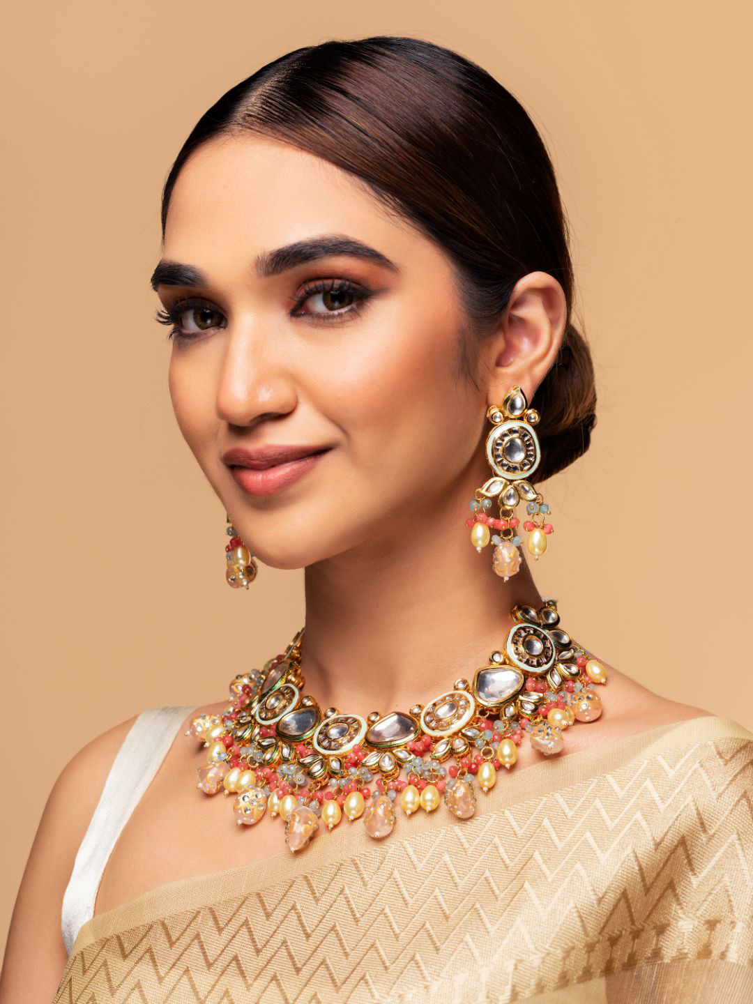 

Priyaasi Gold-Plated White & Pink Kundan-Studded & Pearl-Beaded Handcrafted Jewellery Set