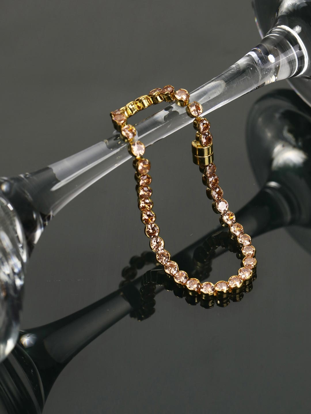 

Priyaasi Women Gold & Pink Handcrafted Link Bracelet