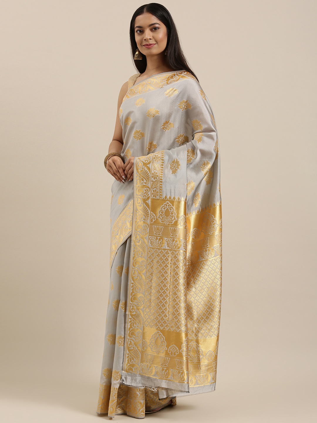 

Ethnovogue by cbazaar Grey & Gold-Toned Floral Zari Art Silk Saree