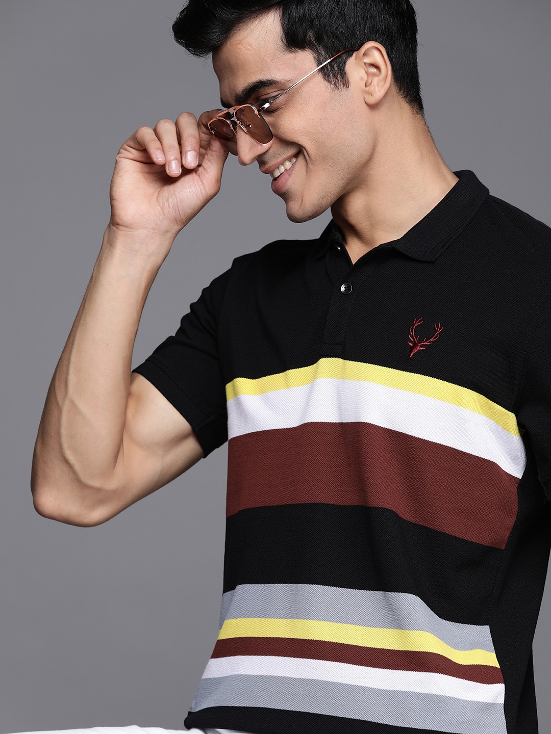 

Allen Solly Sport Men Black & White Striped Polo Collar T-shirt