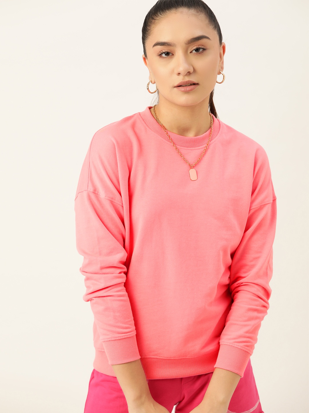 

DressBerry Women Pink Solid Sweatshirt
