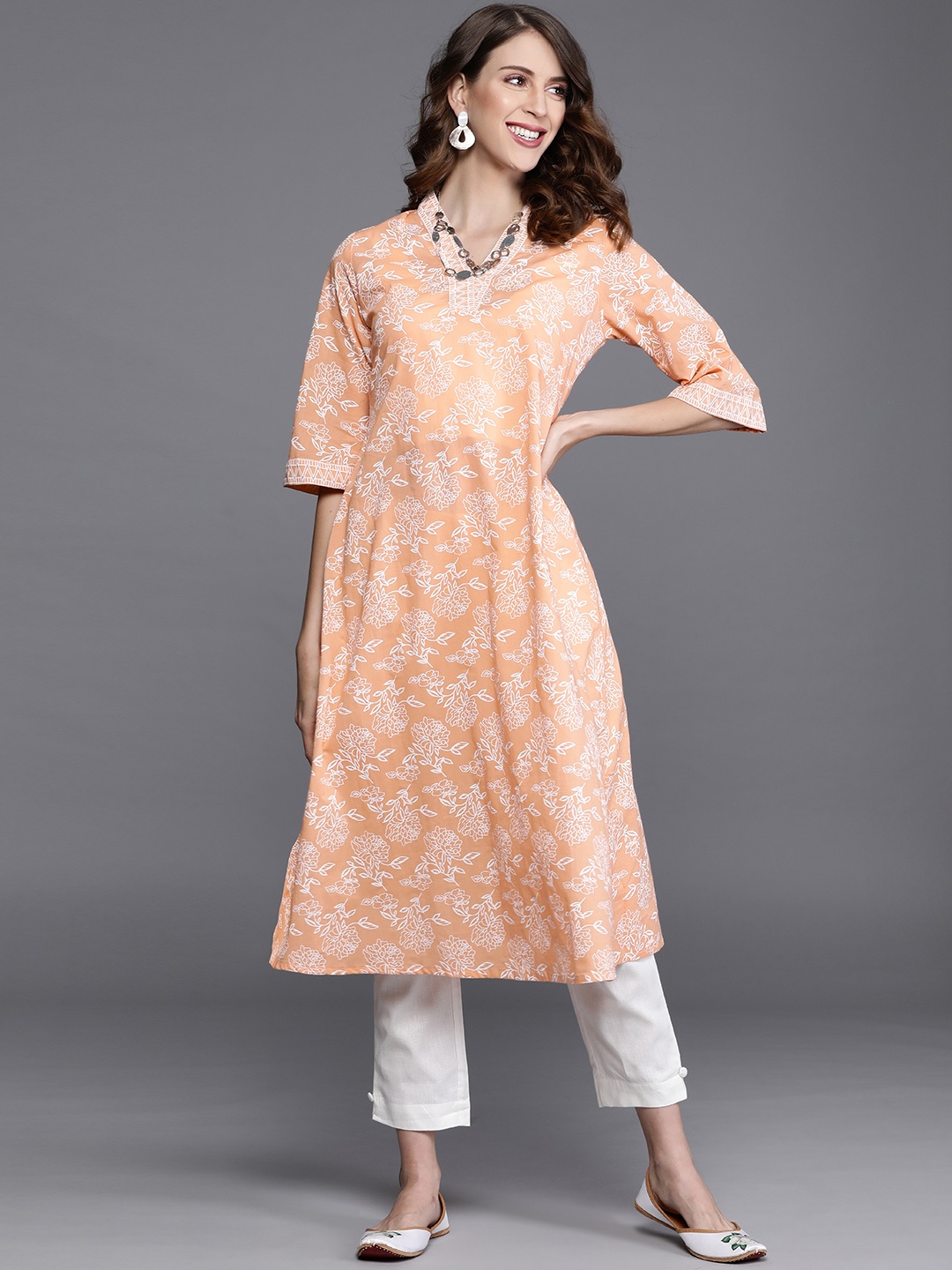 

Libas Women Peach-Coloured & White Floral Motifs Printed Kurta