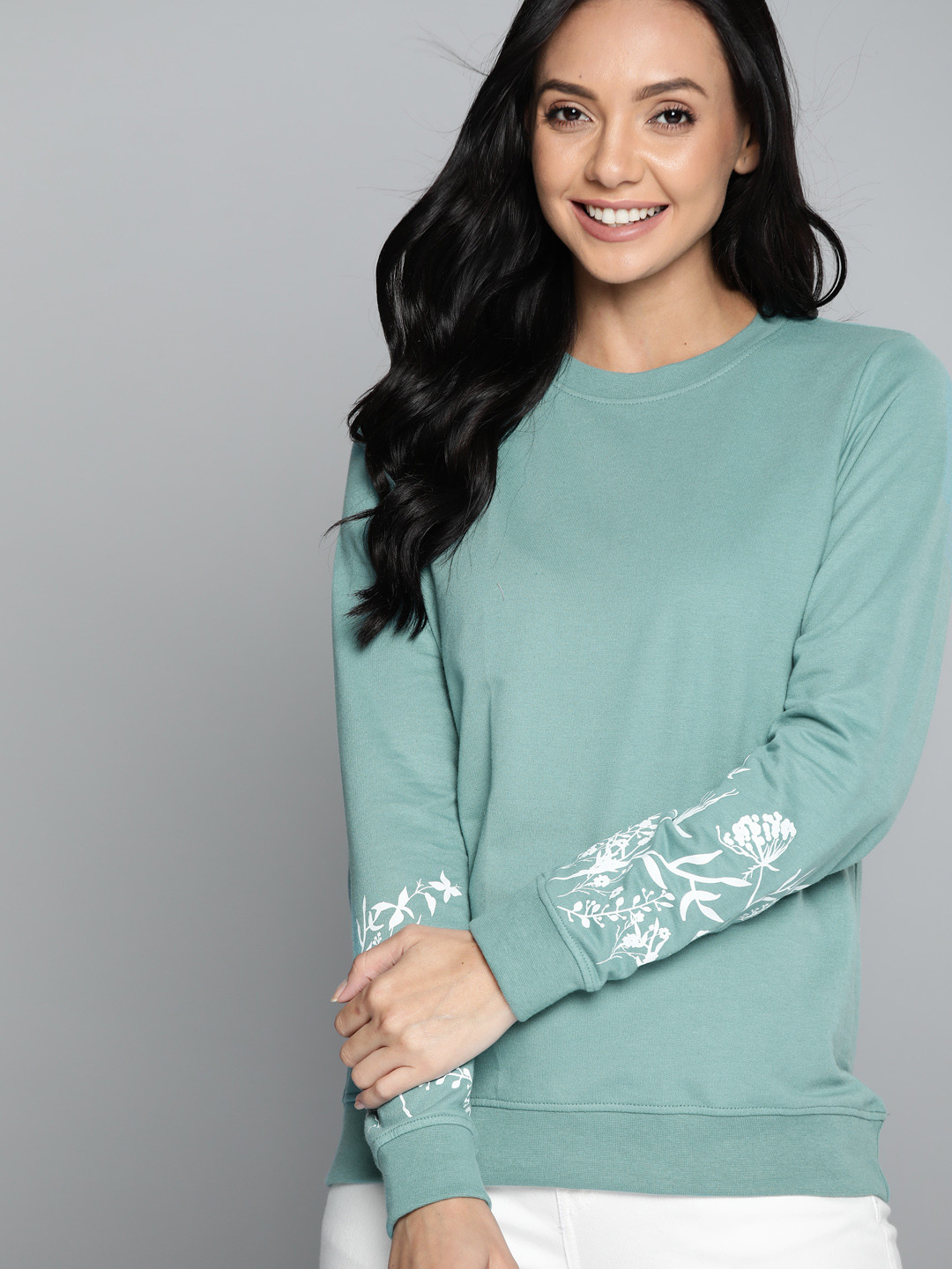 

HERE&NOW Women Green Solid Sweatshirt
