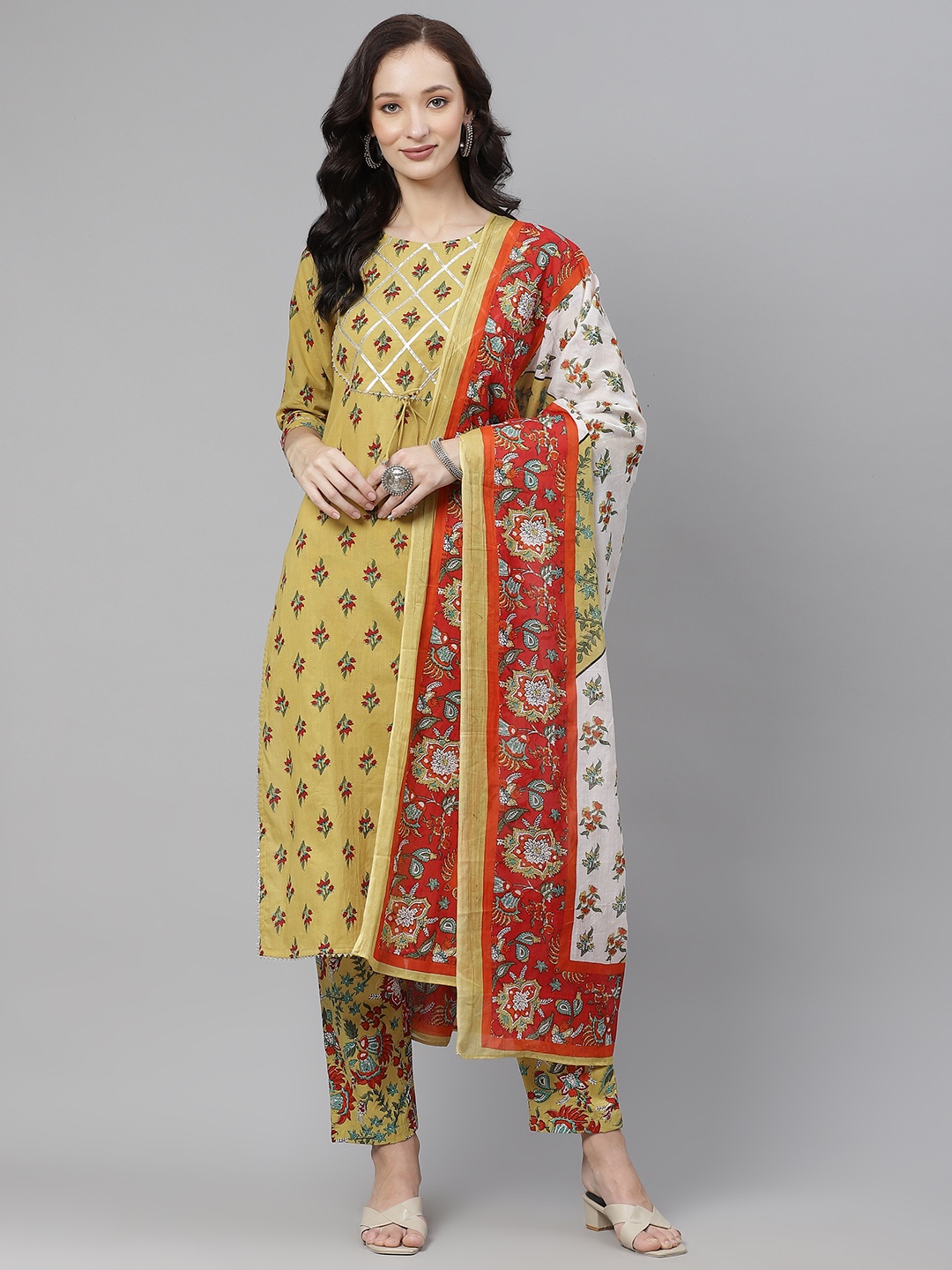 

Yuris Women Mustard Yellow Ethnic Motifs Gotta Patti Cotton Kurta with Trousers & Dupatta