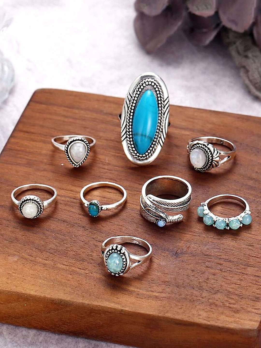 

Yellow Chimes Women Set of 8 Silver-Plated & Turquoise Blue Stones Oxidised Finger Rings