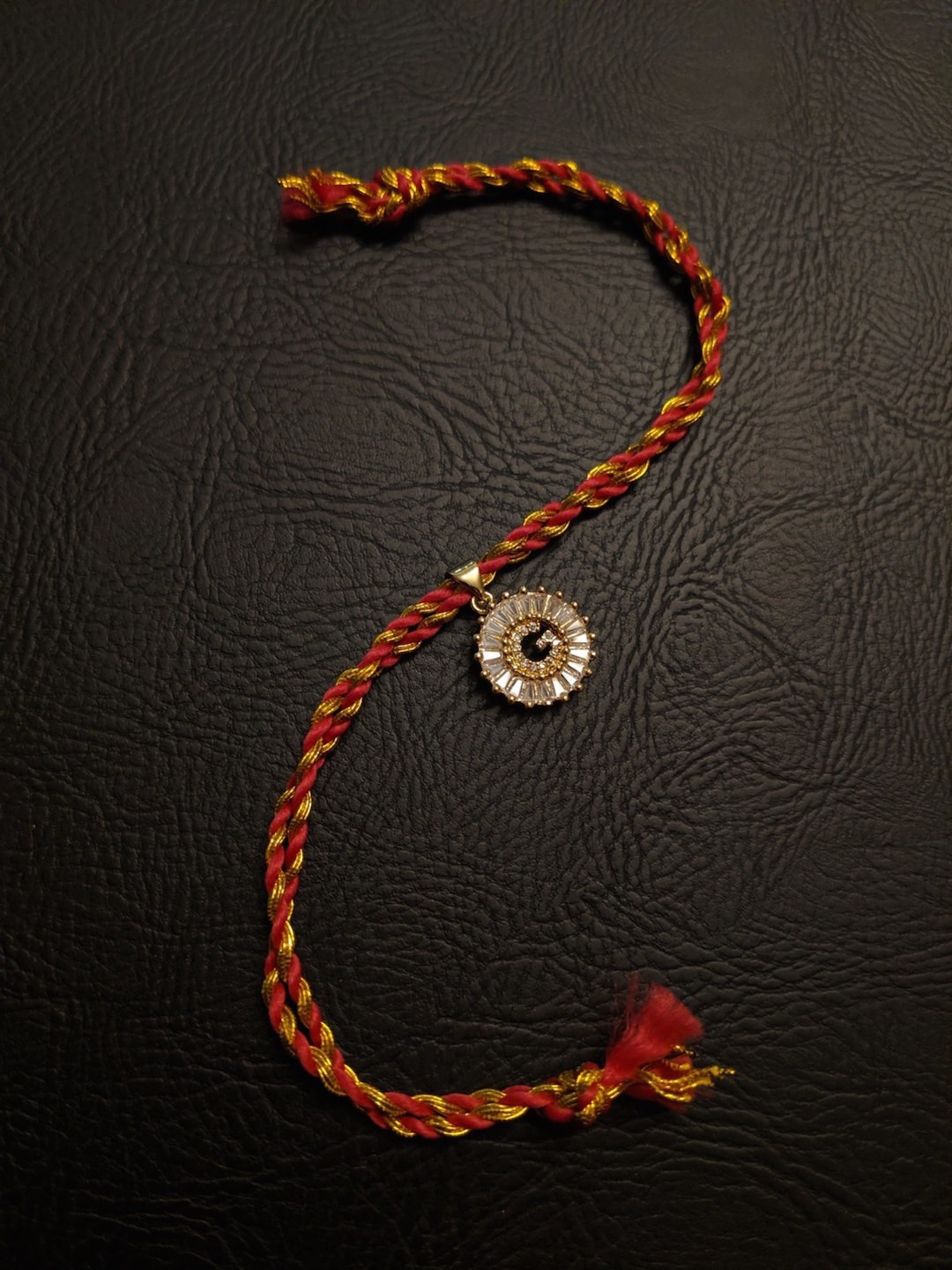 

Digital Dress Room Men Gold Letter G Mauli Thread Rakhi