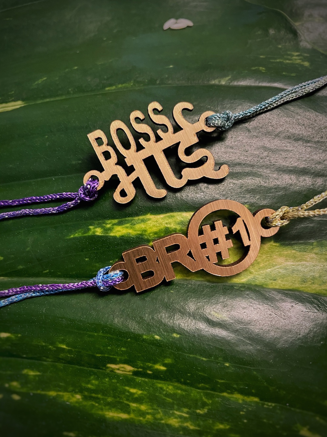 

Digital Dress Room Set of 2 Fancy Rakhi Designs with Slogan Boss Bhai & Bro No.1, Multi