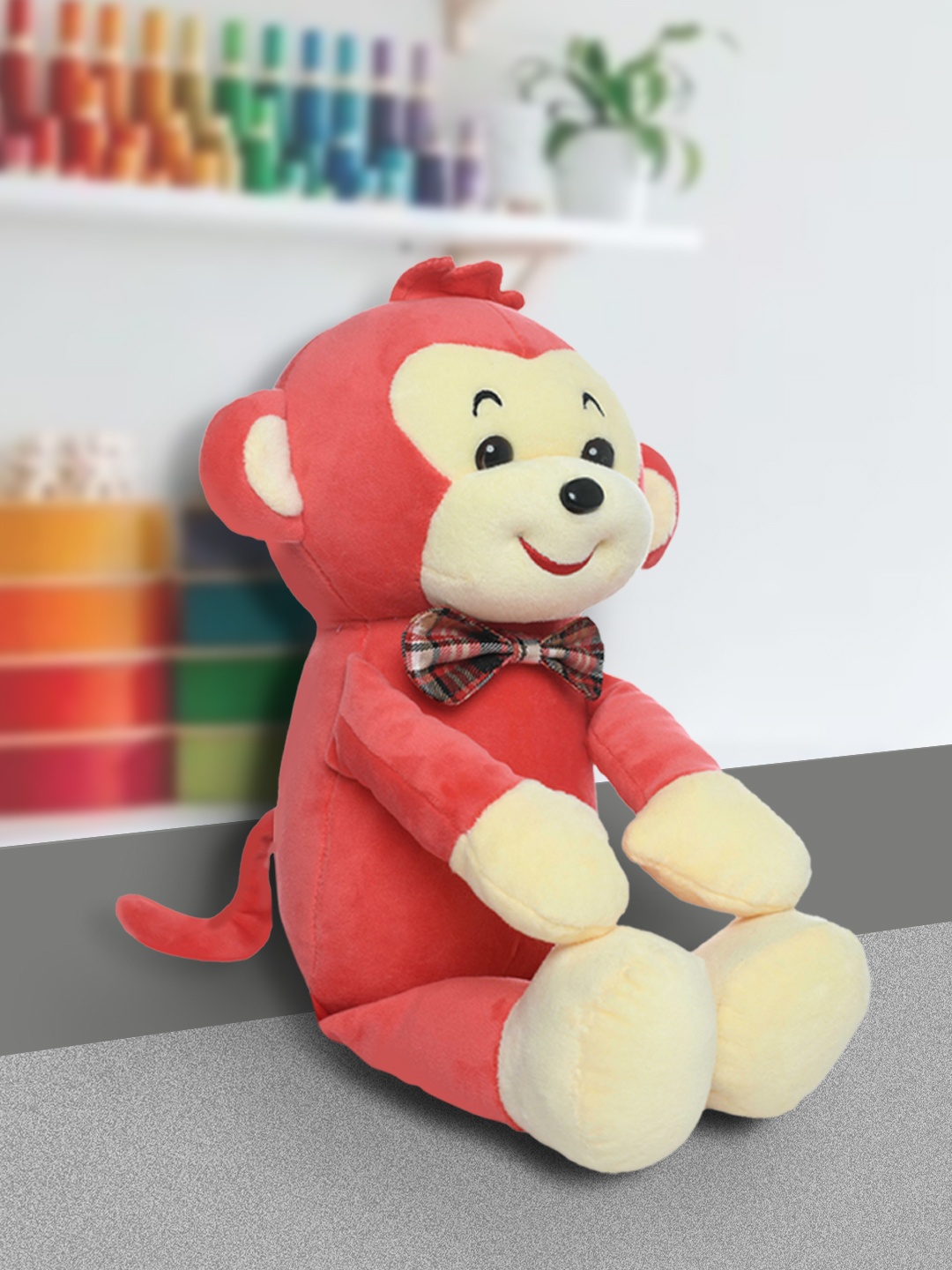 

DukieKooky Kids Red & Off White Monkey Soft Toy With Bow Tie