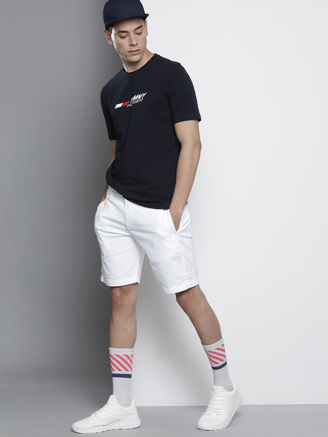 

Tommy Hilfiger Men Navy Blue Brand Logo Printed T-shirt