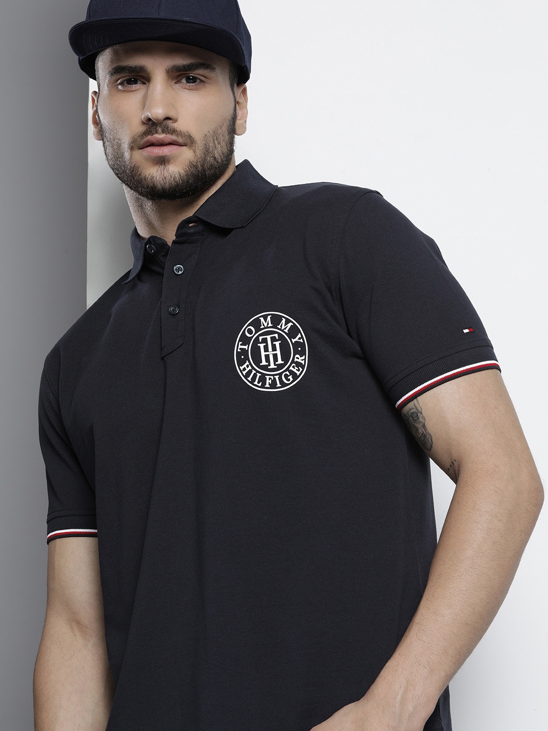 

Tommy Hilfiger Men Navy Blue Polo Collar Pure Cotton T-shirt with Brand Logo Print