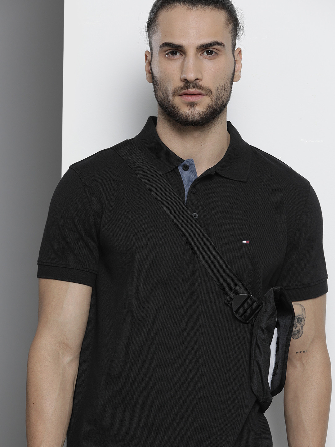 

Tommy Hilfiger Men Black Solid Polo Collar Pure Cotton T-shirt