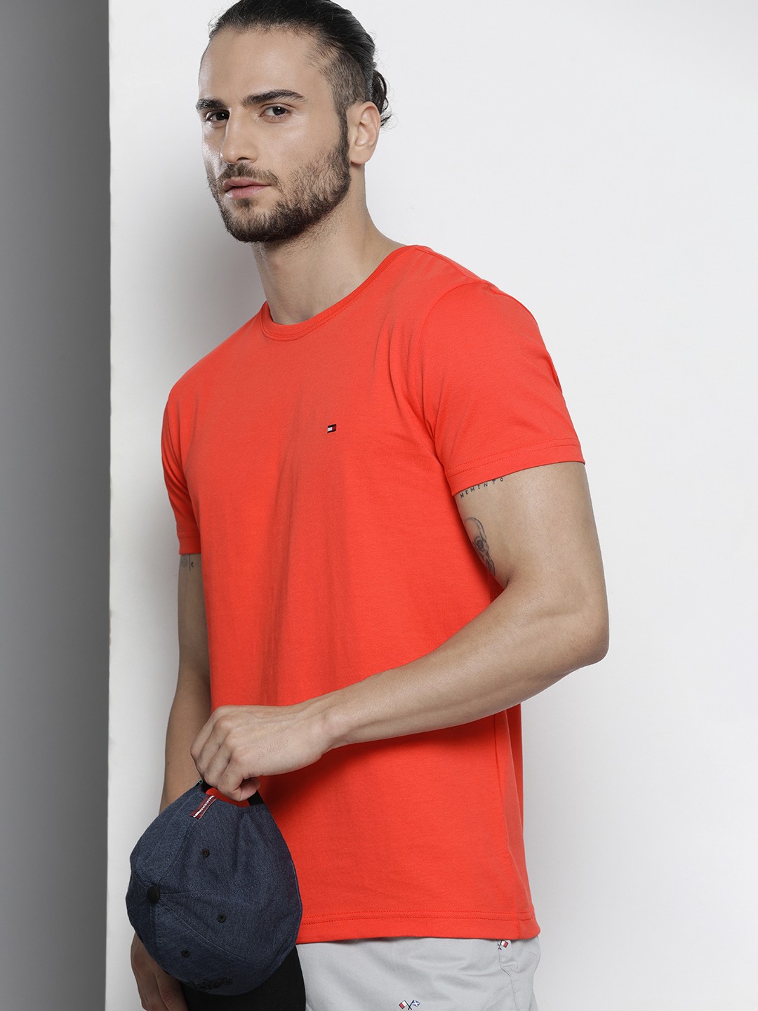 

Tommy Hilfiger Men Orange Solid Round Neck Organic Cotton T-shirt