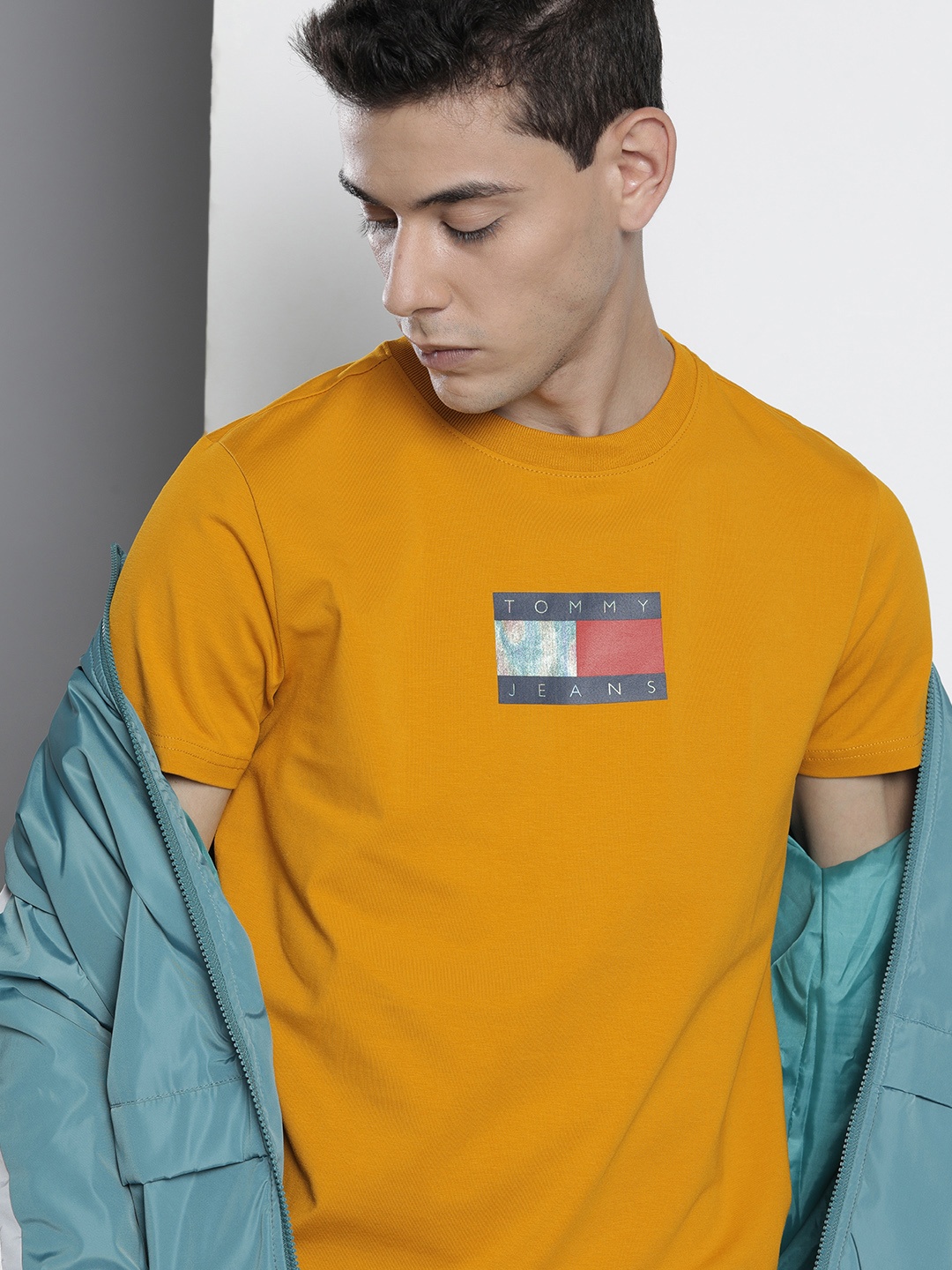 

Tommy Hilfiger Men Mustard Yellow Brand Logo Printed T-shirt