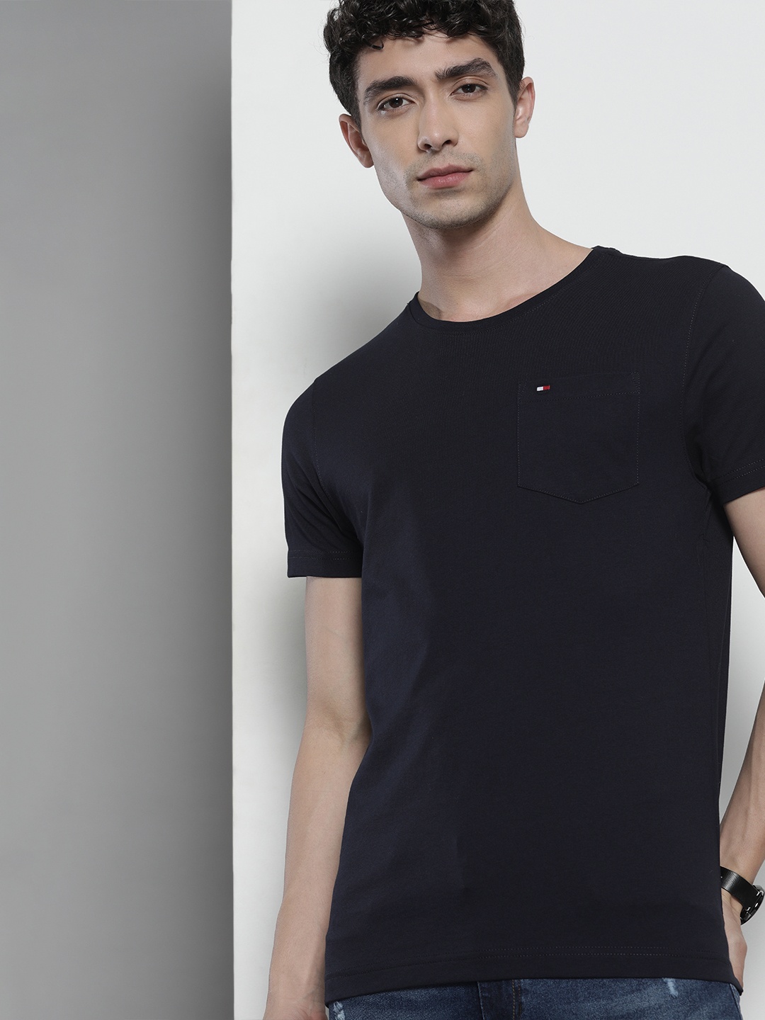 

Tommy Hilfiger Men Navy Blue Solid Pure Cotton T-shirt with Pocket