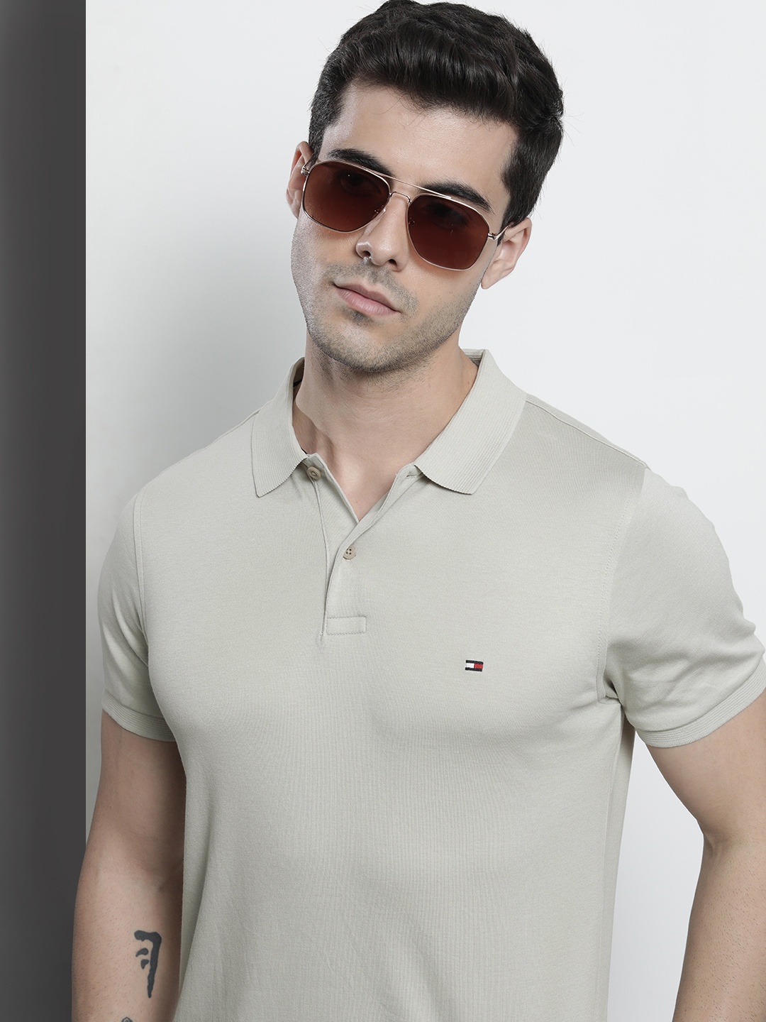 

Tommy Hilfiger Men Light Grey Solid Polo Collar Slim Fit T-shirt