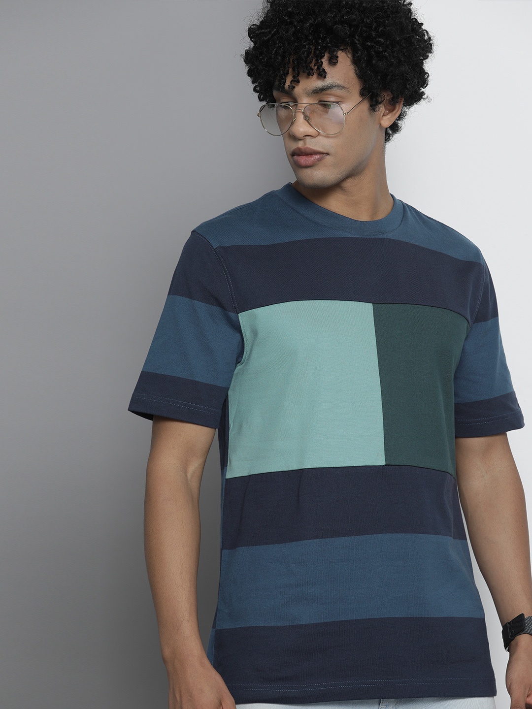

Tommy Hilfiger Men Navy Blue Colourblocked Pure Cotton T-shirt