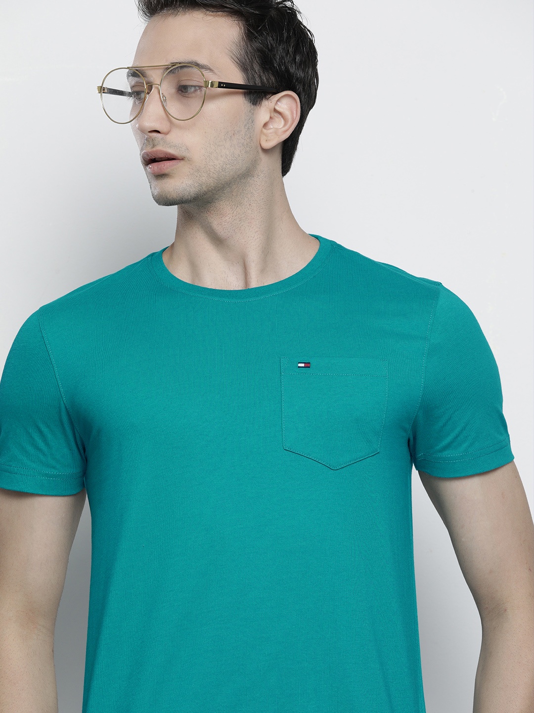 

Tommy Hilfiger Men Teal Green Pure Cotton T-shirt with Pocket